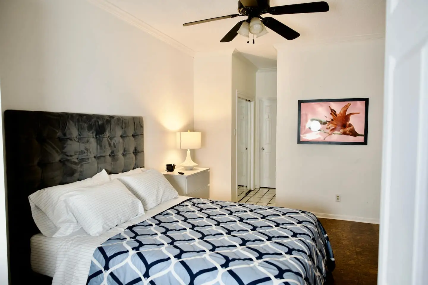Primary bedroom with ceiling fan