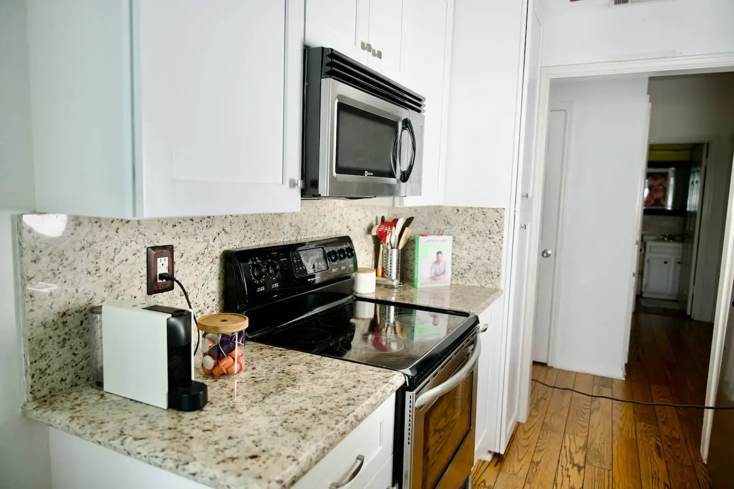 Kitchen counter with coffee maker and stove